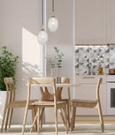 CLA KATHAL: Interior Ellipse Glass Segmented with Brass Highlight Enclosed Pendant Lights