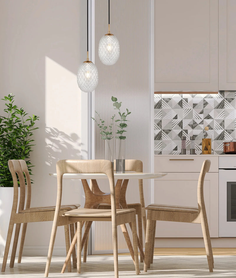 CLA KATHAL: Interior Ellipse Glass Segmented with Brass Highlight Enclosed Pendant Lights